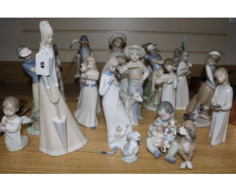 A group of Lladro, Nao and other figures