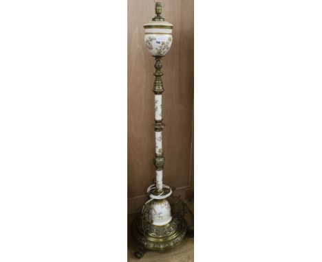 A Victorian cast brass and Royal Worcester lamp standard H.148cm
