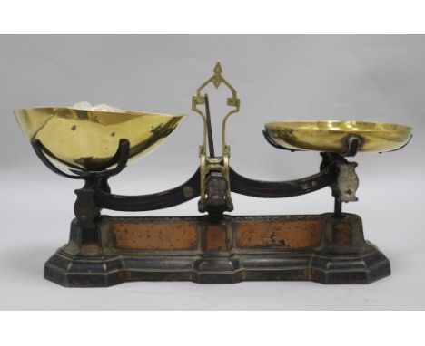 A pair of 19th century brass and iron scales and weights