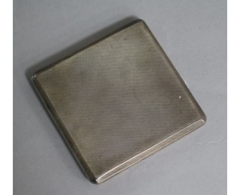 A 1930's engine turned silver slide action cigarette case.