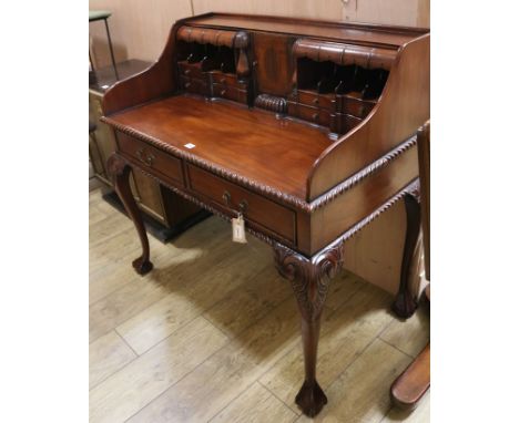 A Chippendale style mahogany writing desk W.107cm