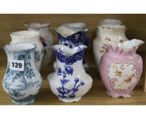 Nine ceramic tooth brush holders