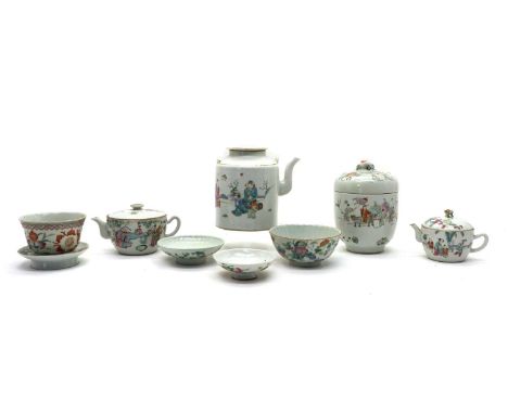 A collection of Chinese famille rose,19th to early 20th century, comprising: three teapots and covers, one of tapering form, 