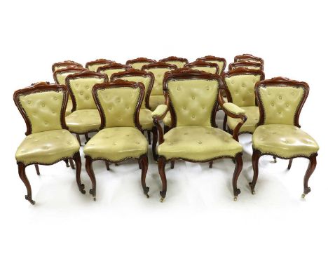 A set of eighteen Victorian mahogany dining chairs,mid-19th century, including one elbow chair, the pad backs and stuff over 