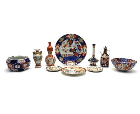 A collection of Japanese kutani,19th to 20th century: comprising: two saucers, nine dishes, one charger, a pair of vases, and