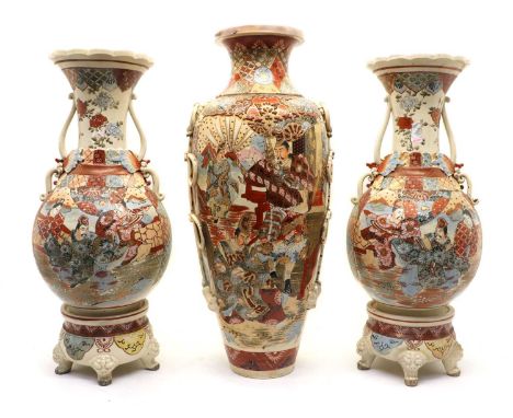 A pair of Japanese Kutani vases,20th century, of globular form, rising to a lobed flared mouth, supported on a circular base 
