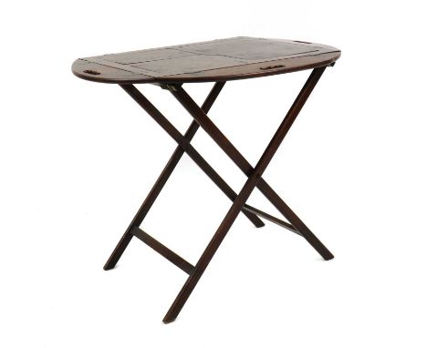 A mahogany butlers tray on stand, early 19th century, the sectioned four panel tray with hinged gallery on a folding square s