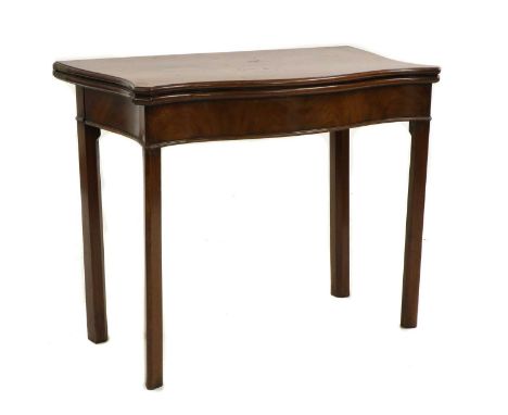 A George III mahogany card table,Chippendale period, c.1770, the serpentine foldover top raised on square section supports wi
