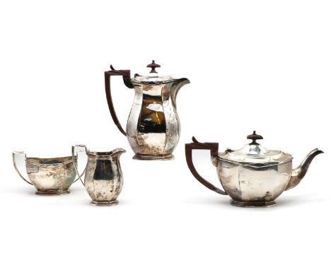 A silver four piece tea service,by C W Fletcher &amp; Son Ltd, Sheffield, 1932, comprising a teapot, 17cm high, hot water jug