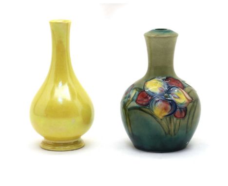 A Moorcroft pottery 'African Lily' pattern lamp,mid to late 20th century, of globular form with a slender neck, impressed mar