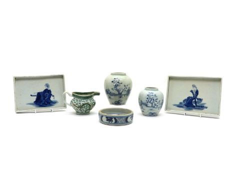 A collection of Chinese blue and white,20th century, comprising: two trays, of rectangular form, both painted with a seated l