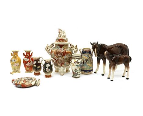 A collection of Japanese pottery,20th century, including three koros and covers, two-lobed jars, eleven vases, decorated with