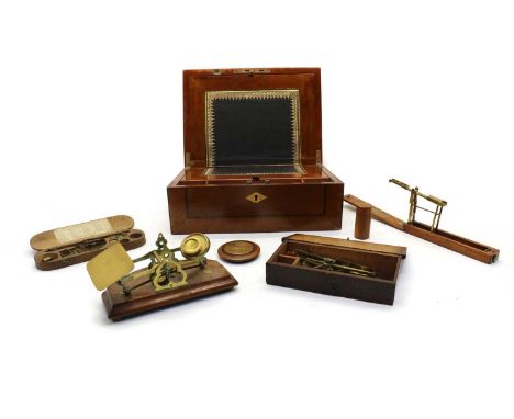A writing box, early 20th century, the slope with leather inset, inlaid,30cm wide21cm deep13cm high together with other scien