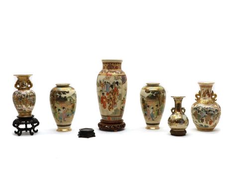 A collection of six Japanese Satsuma ware vases,20th century, painted with figures or arhats in shaped panels, 12 to 14cm hig