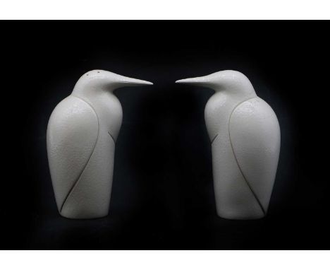 Anthony Theakston (b. 1965) a glazed ceramic salt and pepperette modelled as penguins, both stamped 'AT' (to the underside)ea