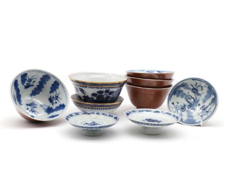 A collection of Chinese blue and white cups and covers,late Qing dynasty, comprising: one, painted with a landscape, 10cm hig