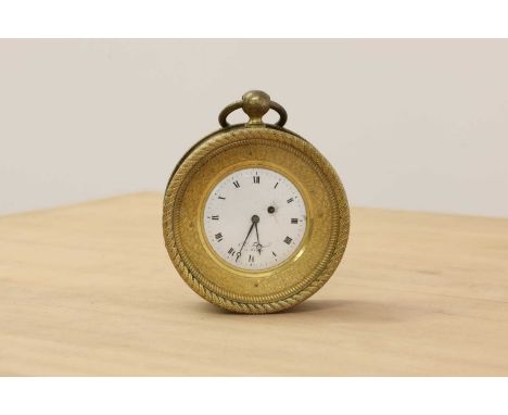 A French gilt brass drum cased clock, the convex white enamel dial inscribed 'Chs Frisard a Rouen', with top ring handle,14.5