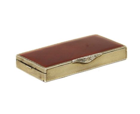 A continental silver compact,early 20th century, struck 925, with London import marks, the lid with red enamel over a bellflo