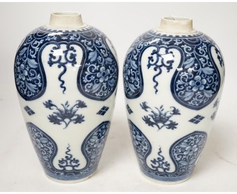 A pair of Samson of Paris blue and white vases, in Kangxi style 23cm high. Condition - good Good condition; no covers.