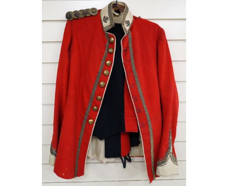 A Sixth Light Infantry officer’s uniform with epaulettes, comprising jacket and dress trousers. Condition - poor to fair, som