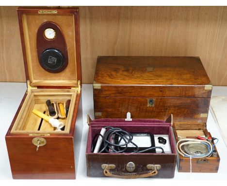 A writing slope, humidor and contents including a silver mounted cigar case, an Evans Electroselenium Ltd. light meter and a 