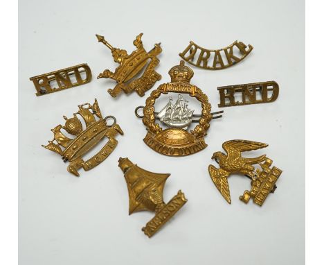 Five Royal Navy First World War brass cap badges; the Nelson, Hawke, Anson and Howe Battalions, together with three shoulder 