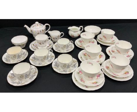 A Shelley ‘Ferndown’ tea service for one; five Coalport ‘Camelot’ tea cups and saucers; a Coalport ‘Caughley Sprays’ tea set 