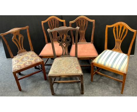 A 19th century Chippendale style mahogany hall chair, pierced splat, drop-in seat, square legs;  another four 19th century ch