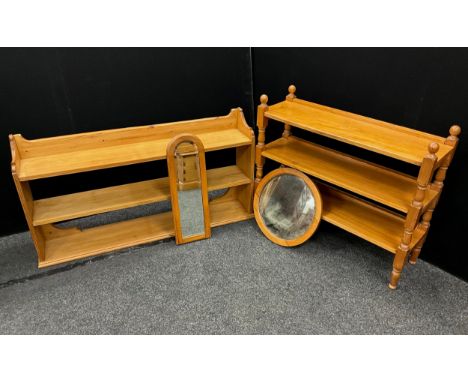 A pine kitchen wall shelf, 70cm high x 133cm wide x 24.5cm deep;  a pine floor-standing open shelving unit, 84.5cm high x 99c