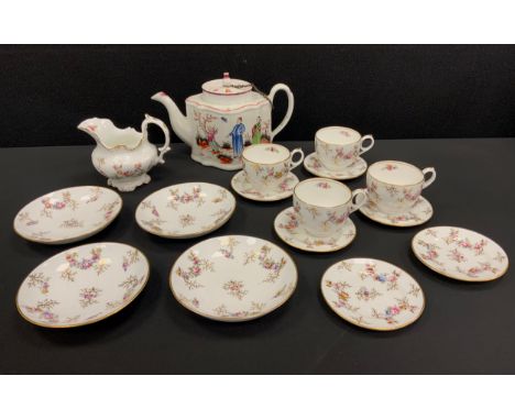 A 19th century Newhall Boy and Butterfly pattern teapot, pattern number 221;  19th century part tea set, painted with Posies 