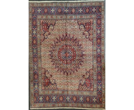 A North East Persian Moud Carpet central medallion, multi-tone field, 295cm x 215cm 
