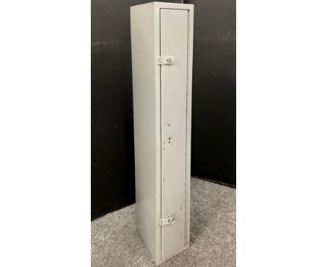 A metal floor standing Gun cabinet, with internal lockable ammunition compartment, 148cm high x 23cm wide x 31cm deep. 