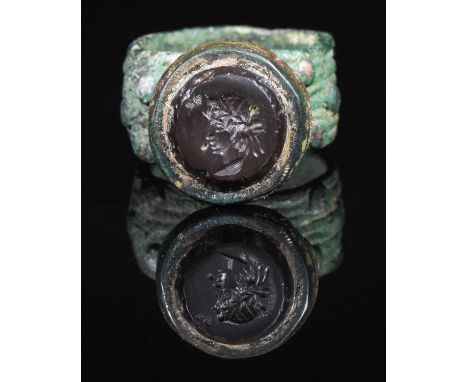 Ca. 425 AD. Important WESTERN ASIATIC Sassanian signet ring with portrait of a king, possibly, Bahram V; Bahram V, also known