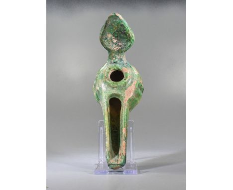 Ca.1200 AD. Interesting clay moulded oil lamp with elongated body and handle. In a beautiful green glaze characteristic of th