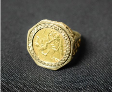 A 1982 half sovereign ring, 9ct gold shank 