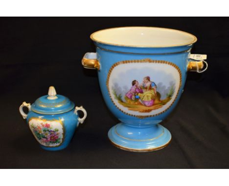 A 19th Century French two handled ice pail, painted with gilt oval cartouches of courting  couples in period dress, on a bleu