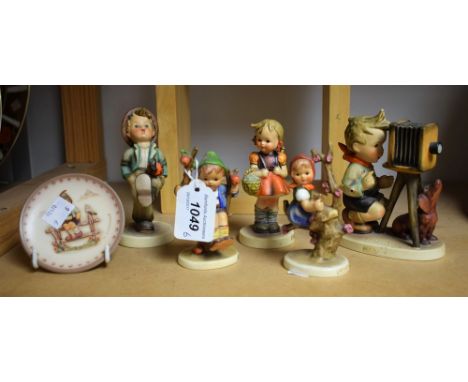 A Goebel ceramic figure, The Photographer; others, School Girl, Apple Tree Girl, etc (6)