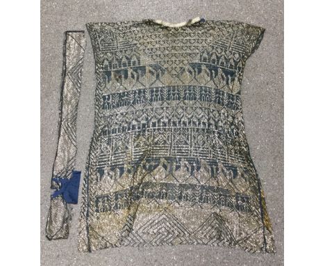 An Art Deco Egyptian Assuit silver scaled and metal thread shawl/tabard, banded geometric motifs, wine ewers and figures, blu