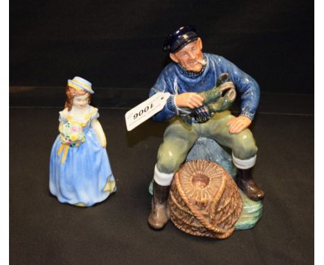 A Royal Doulton ceramic figure, The Lobster Man HN2317; a Coalport figure, Joan (2)