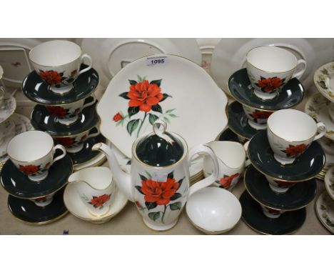 A Royal Albert Tahiti pattern part tea and coffee set for six comprising coffee pot, cream jugs, sugar bowls, side plates, ca