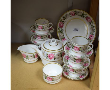 A Royal Worcester Royal Garden pattern tea set for six comprising tea pot, sugar bowl, cream jug, sandwich plate, cups and sa