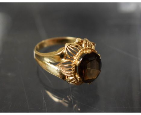 A 9ct gold smoky quartz dress ring, 6.8g gross 