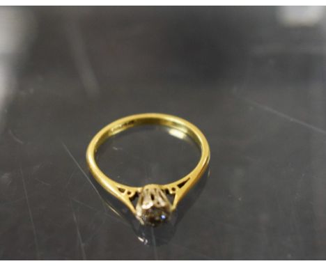 A diamond solitaire ring, round brilliant cut, approx 0.10ct, 18ct gold shank, Birmingham 1965, size K, 2.1g gross