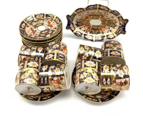 Eight Royal Crown Derby Duesbury coffee cans and saucers Patt.2451 and a matching oval dish