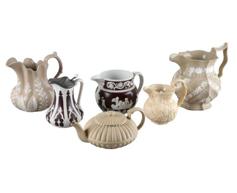 A STONEWARE JUG BY ROYAL CLARENCEmarked to the base, 19th century, moulded in relief with bands of flowers and foliage, 23cm 