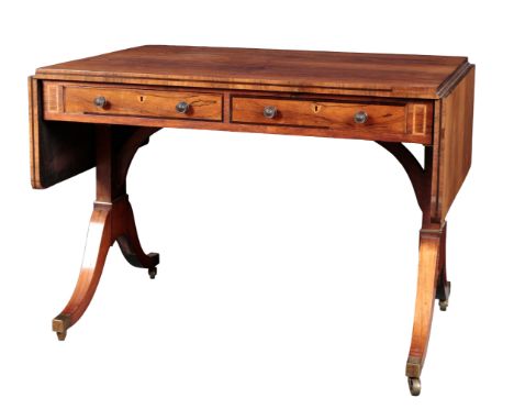 A GEORGE IV ROSEWOOD SOFA TABLEthe rectangular top over two frieze drawers to one side and two faux drawers the other, on twi