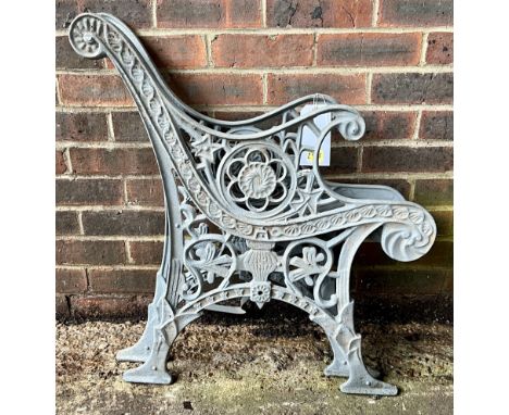 A PAIR OF GREY PAINTED CAST IRON BENCH ENDS80cm high