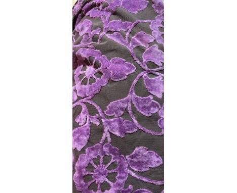 A PAIR OF BLACK GROUND AND PURPLE FOLIATE DECORATED CURTAINS406 wide; 260cm long, with a pair of tie-backs, 56 x 13cmPossibly