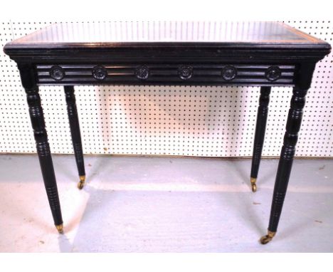 A 19TH CENTURY EBONISED RECTANGULAR CARD TABLE91cm wide; 45cm highOld marks and scratches to the top section, beize recently 