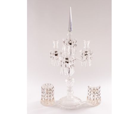 A VICTORIAN GLASS LUSTRE THREE LIGHT CANDELABRUM AND A PAIR OF CANDLESTICKS (3)With prism finial, on baluster base; 64cm high